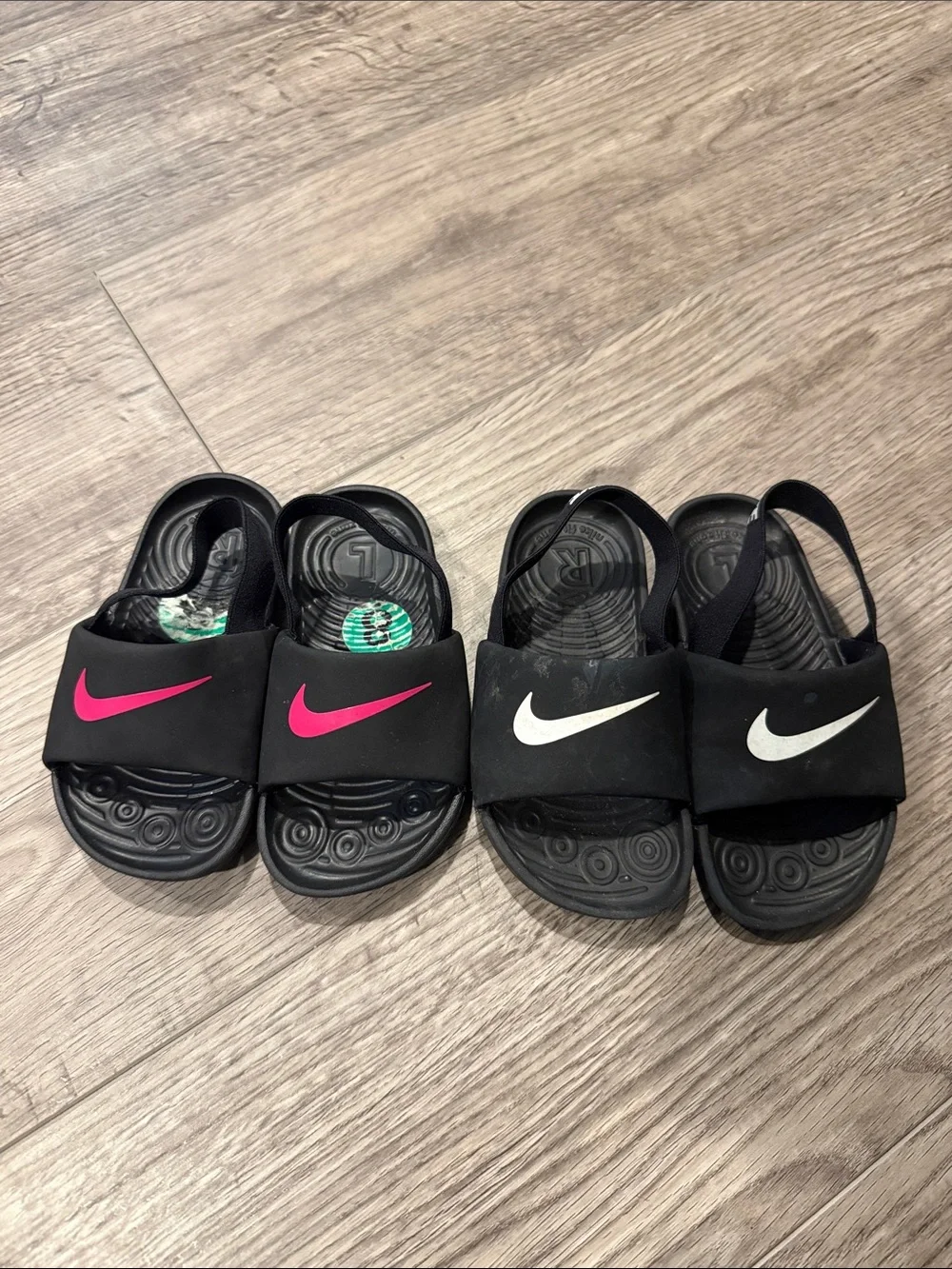 Nike Kids Black Slide Sandals with Pink and White Swoosh